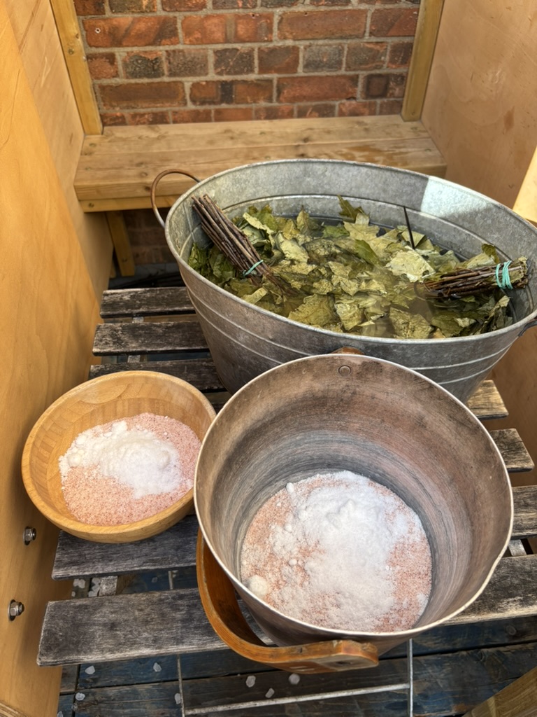 Himalayan salt and birch whisks used in sauna ritual
